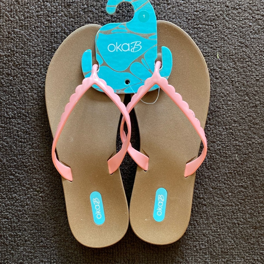 Oka b flip flops size 7.